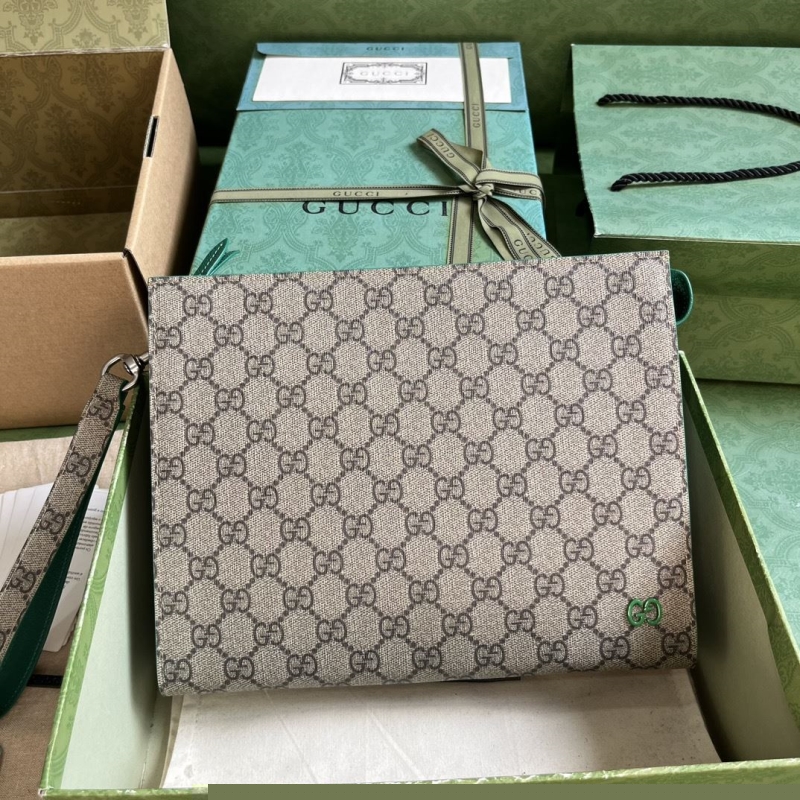 G*u*i clutch bags
